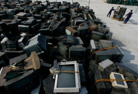 China`s booming middle class drives Asia`s toxic e-waste mountains 